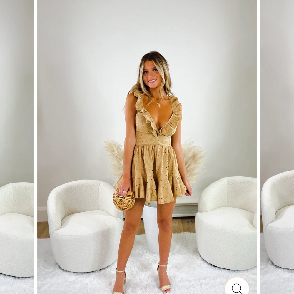 New romper, never worn. Very cute but just too big for me.